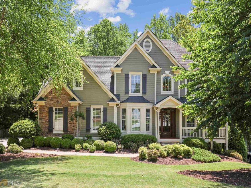 Amazing opportunity to own this beautiful craftsman house in sought after Park Shore! This incredible home offers a very bright open floor plan. As soon as you approach the house, you will be greeted by a cozy front porch. The main front door leads to an inviting two story foyer with a beautiful chandelier. To the left, is a large dining room with tray ceiling. To the right of the foyer (opposite the dining room) you will see an inviting sunny family room. As you continue through the foyer, you will reach the great family room with fireplace, fully upgraded kitchen  with SS appliances, granite countertops and updated cabinets, breakfast room that leads to the deck. Laundry room is also on main floor. The finished terrace level offers a full bedroom & bath, access to stunning custom built stone patio. The 2nd floor offers: master suite with separate private study, master bath and private small deck. Secondary bedrooms are all large and full bath has two separate vanities. Community amenities include boat dock on Lake Lanier, cookout pavilion, pool & tennis courts. This is a prime location only minutes away from GA 400, shopping & restaurants.