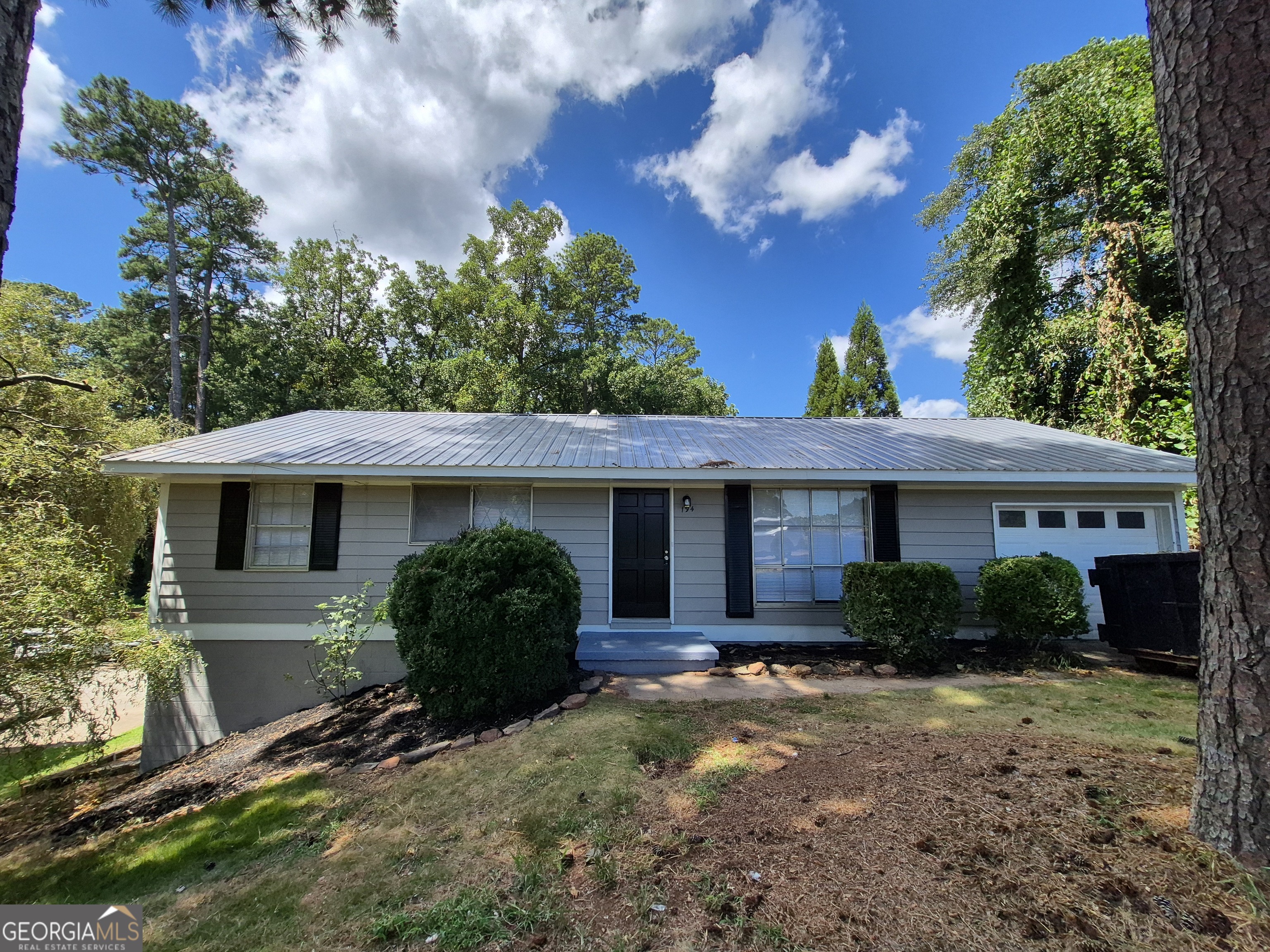 Charming 3-Bedroom Home Near Downtown Athens & UGA! This 3-bedroom, 1.5-bath home offers comfort and convenience just minutes from downtown Athens and the University of Georgia campus. The galley-style kitchen features stainless steel appliances (fridge and microwave not included), with a functional layout perfect for everyday living. Enjoy outdoor living on the back deck and take advantage of the attached garage and full unfinished basement-ideal for storage or future expansion. A great opportunity in a prime location!