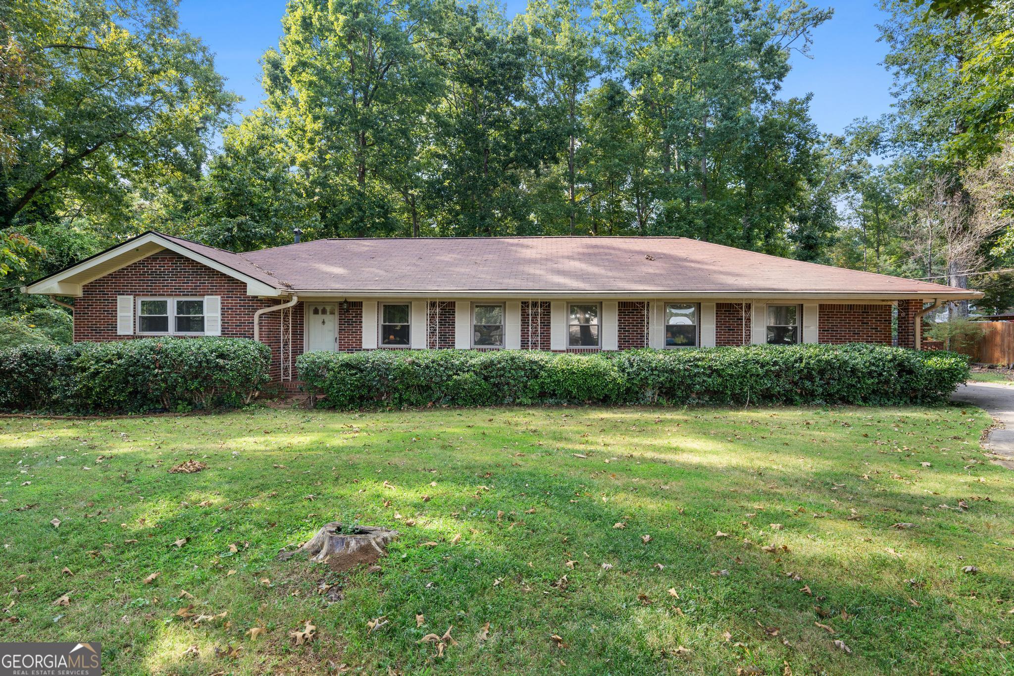 Escape to the tranquility of LAKE TALMADGE with this charming 2 BEDROOM, 1.5 BATHROOM HOME that feels like your own private retreat. Nestled in a peaceful setting, this property offers the perfect blend of comfort and relaxation. Step inside to find a LARGE LIVING ROOM that welcomes gatherings and quiet evenings alike, along with two SPACIOUS BEDROOMS designed for rest and retreat. Enjoy the outdoors from your SHADED BACK PORCH, where you can take in the calming views and gentle breeze from the lake. The LEVEL YARD provides plenty of room for outdoor activities, gardening, or simply soaking in the natural beauty that surrounds you. Whether you're looking for a weekend escape or a cozy full-time residence, this home delivers the serenity of lakeside living.