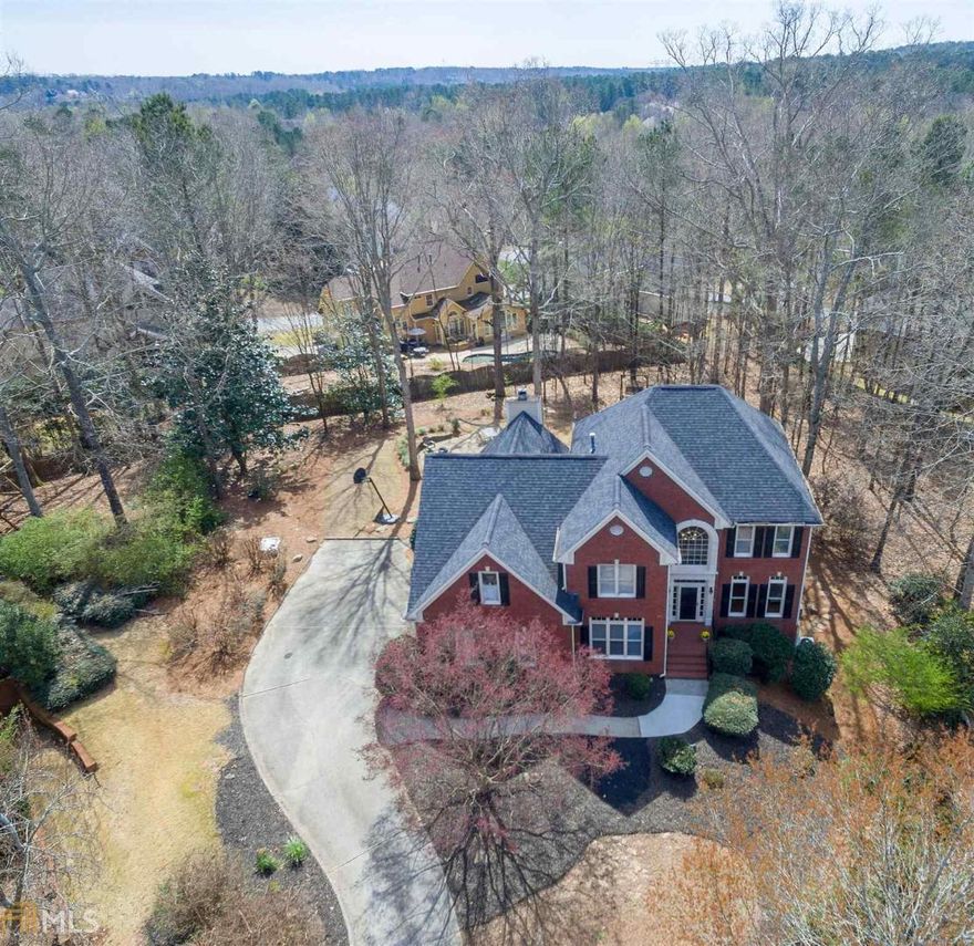 Welcome to your beautiful estate home perfectly situated on a cul de sac homesite in the exclusive Edgewater community. Low taxes and top schools. Brand NEW paint and spotless hardwoods. Remodeled owner’s suite bath and recently updated hardware. Enjoy the wooded privacy in your professionally landscaped back yard complete with firepit and relaxing water feature. Fully finished terrace level is perfect as an in-law suite or teen retreat.  You will love it.  Welcome HOME.