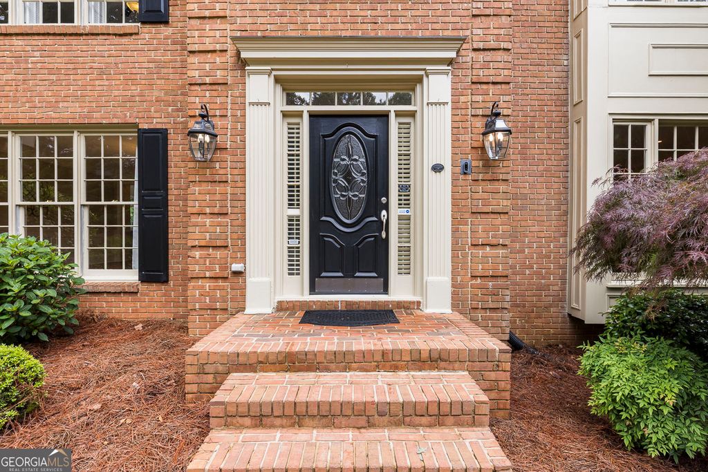 Photo of 7390 Stoneykirk Close, Atlanta, GA 30350 (MLS # 10760484)