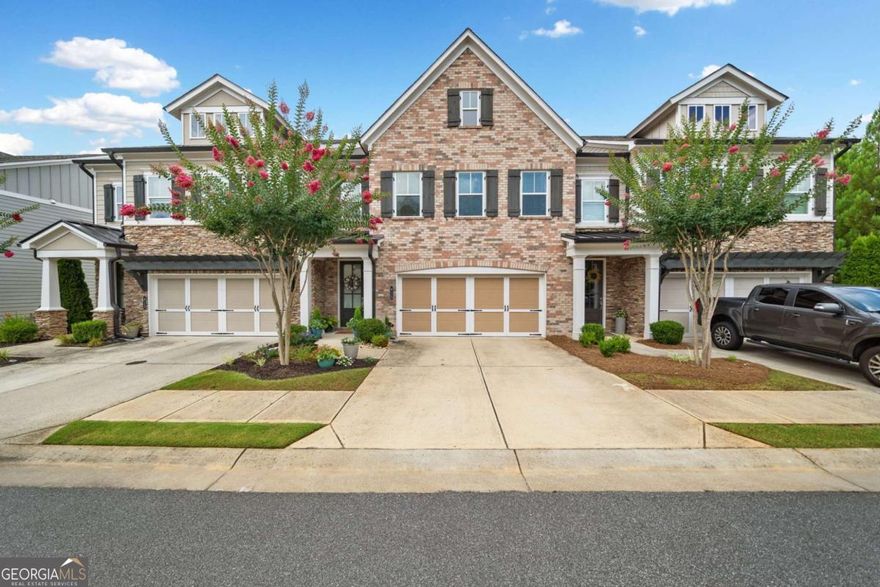 The Beautifully maintained 3-bedroom, 2.5 bathroom townhome offers over 2,500 square feet of spacious, modern living. The open floor plan features hardwood floors, a cozy fireplace and a gourmet kitchen with stainless steel appliances, granite countertops and an oversized island-perfect for entertaining. Upstairs, you will find a luxurious primary suite with a spa-like bath and generous closet space. Enjoy your morning coffee on the private covered patio or take advantage of the community amenities, including covered barbeque area, dog park and walking trails. Conveniently located just minutes from vibrant Downtown Roswell and Downtown Woodstock, shopping, dining and top-rated schools. This low maintenance living at its finest. Home has an elevator shaft if you want to have one installed.