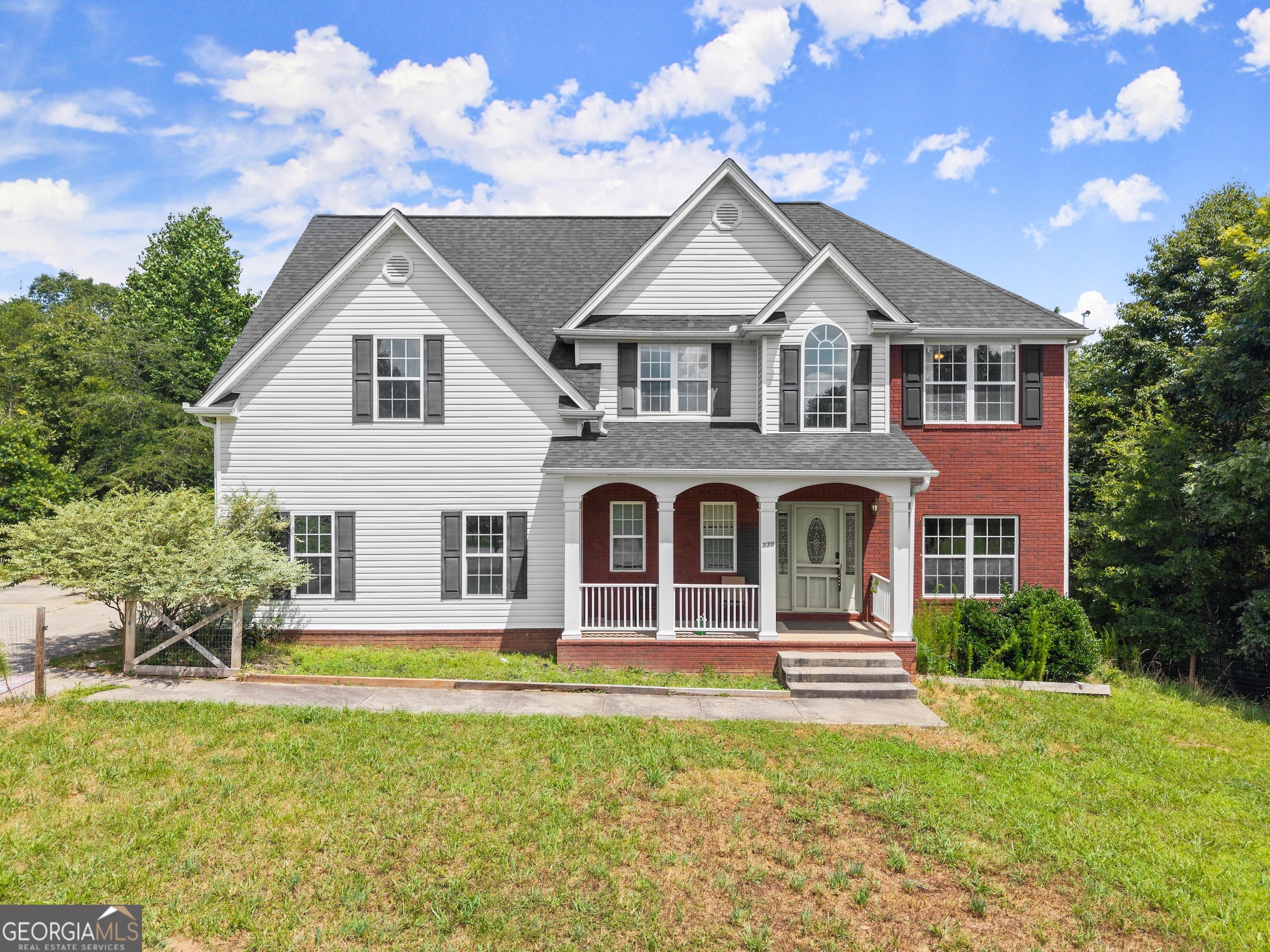 Welcome to 930 Heads Ferry Rd in Cornelia - a spacious 4 bedroom, 2.5 bathroom home on a private 1-acre lot. The main level features a two-story foyer, a large living room with a fireplace, and a kitchen that opens to the breakfast area. The primary suite offers double closets, a separate shower, and a whirlpool tub. Two additional bedrooms and a full bath are also on the main floor. There's a full, unfinished daylight basement already stubbed for a bathroom, offering potential for future expansion. A rocking-chair front porch and back deck provide great outdoor space. A side-entry two-car garage adds convenience, and the location is close to Hwy 365 for easy access to surrounding areas.