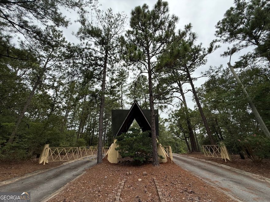 Historic Camp Benjamin Hawkins - Turnkey Campground in Byron, GA    Discover a rare opportunity to own a piece of history with the former Boy Scout Camp Benjamin Hawkins. Established in the early 1920s and operated for nearly 100 years, this remarkable property offers over 485 acres of natural beauty and recreation potential in the heart of Georgia.    The camp features:    12-acre lake (to be rebuilt)    Over 42 buildings, including a dining hall with commercial kitchen, trading post, bunkhouses, and cabins    10+ individual campsites, each with bathrooms and running water    Multiple bathhouse facilities throughout the property    Ropes course and climbing tower    Archery, pistol, and shotgun ranges    Equipment and storage buildings    A 1,800 sq. ft. manager's residence with 3 bedrooms and 3 bathrooms    Now annexed into the City of Byron, the property is served by county water, electricity, and high-speed internet, with the potential for sewer access.    Ideally located just minutes from I-75, the camp sits 1 hour and 20 minutes south of Atlanta and 20 minutes south of Macon, making it easily accessible for visitors from across the state.    This turnkey campground is perfectly suited for a youth camp, church retreat, outdoor education center, or private recreational development. With its extensive infrastructure and central location, Camp Benjamin Hawkins is ready for its next chapter.