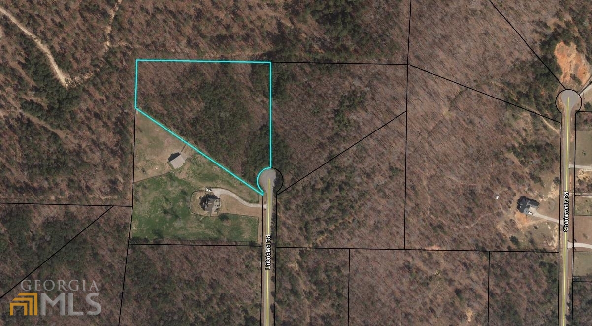 Great price on this 5 acre culdesac building lot in The Derby subdivision. Street lights and utilities in place in an established neighborhood. The Derby is a small neighborhood community of fine homes on large lots perfectly located between Cartersville and Rome, Georgia. Just off Hwy 411 and 15 minutes to I-75. This a wooded, sloping, culdesac basement type lot.