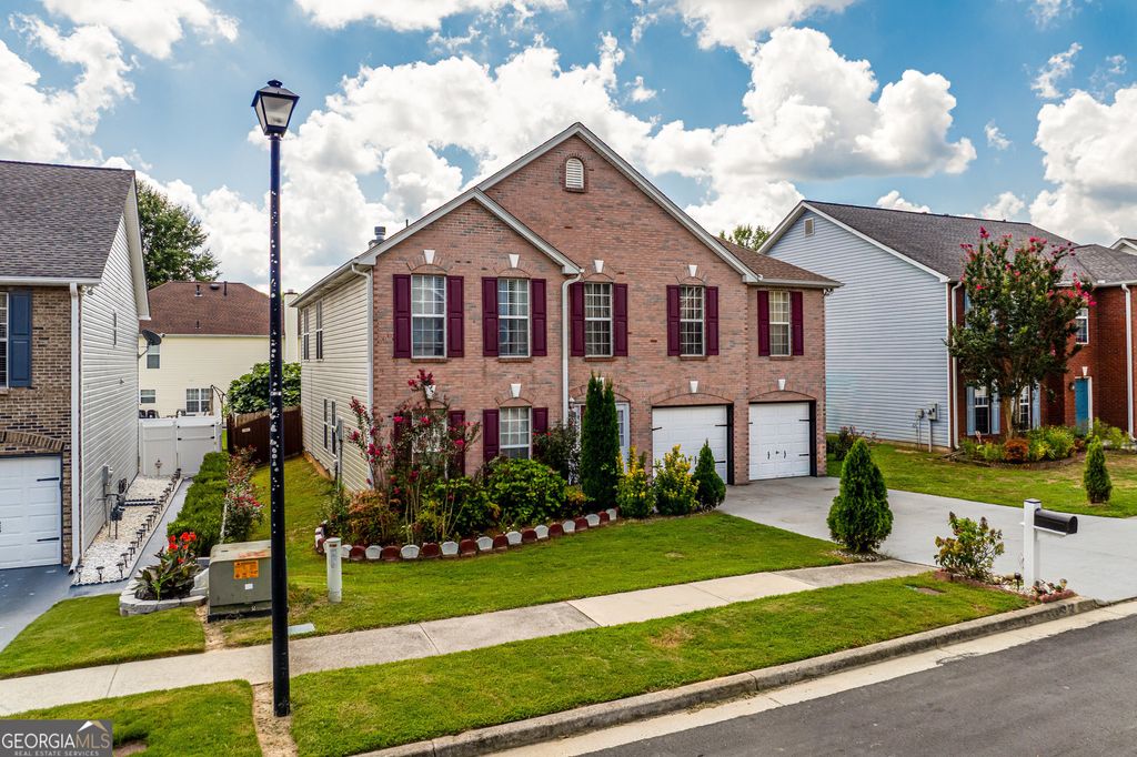 Photo of 2760 Rusticwood Drive, Snellville, GA 30078 (MLS # 10753623)