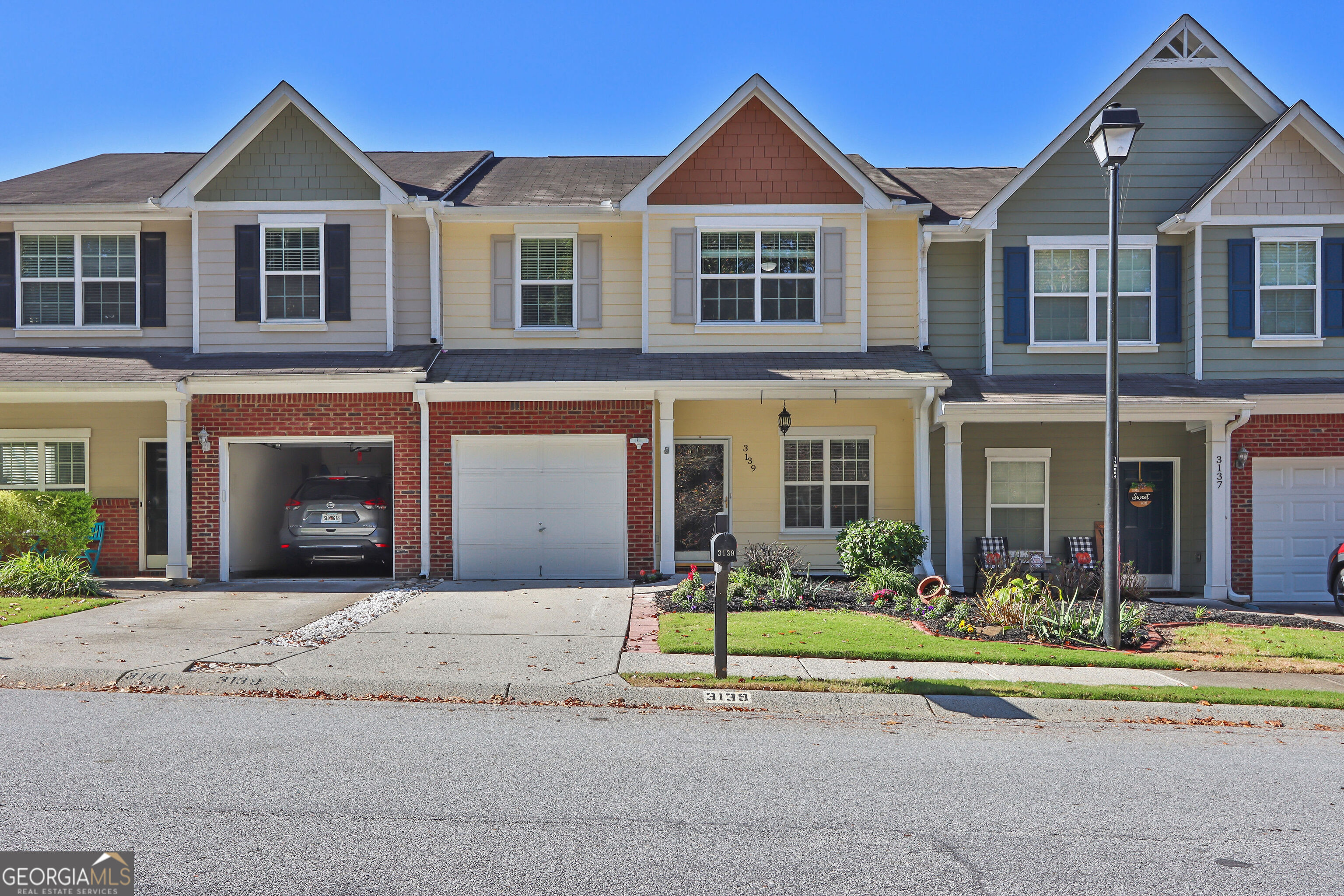 Your Dream Home Awaits in Vibrant Buford! Step into pure bliss with this stunning, fully renovated condominium in the heart of Buford's most sought-after neighborhood! Tucked away on a serene, tree-lined street, this dazzling gem sparkles with modern flair and irresistible charm. Get ready to fall in love with every detail: Fresh, Modern Vibes: Freshly painted interiors create a bright, welcoming atmosphere. Gleaming Hardwood Floors: Refinished to perfection, adding timeless elegance. Chef's Dream Kitchen: Sleek, updated finishes and top-notch appliances make cooking a joy. Brand New Comfort Systems: Stay cool with a new HVAC (2023)and enjoy endless hot showers with a new water heater (2023). Private Backyard Oasis: Unwind or entertain under a custom pergola in your fenced-in retreat perfect for starlit gatherings or peaceful mornings. Luxurious Master Suite: Spacious walk-in closet and private bath for your ultimate relaxation. Prime Location, Endless Convenience. Just minutes from I-85 and the Iconic Mall of Georgia, you're surrounded by vibrant dining, shopping, and entertainment options. Plus, your kids will thrive in Georgia's #1 school district, celebrated for excellence 10 years running! Don't miss your chance to own this move-in ready masterpiece where modern luxury meets unbeatable location. COMING SOON!!!