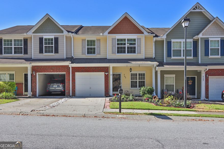 Your Dream Home Awaits in Vibrant Buford!  Step into pure bliss with this stunning, fully renovated condominium in the heart of Buford's most sought-after neighborhood! Tucked away on a serene, tree-lined street, this dazzling gem sparkles with modern flair and irresistible charm. Get ready to fall in love with every detail:  Fresh, Modern Vibes: Freshly painted interiors create a bright, welcoming atmosphere.  Gleaming Hardwood Floors: Refinished to perfection, adding timeless elegance.  Chef's Dream Kitchen: Sleek, updated finishes and top-notch appliances make cooking a joy.  Brand New Comfort Systems: Stay cool with a new HVAC (2023)and enjoy endless hot showers with a new water heater (2023).  Private Backyard Oasis: Unwind or entertain under a custom pergola in your fenced-in retreat perfect for starlit gatherings or peaceful mornings.  Luxurious Master Suite: Spacious walk-in closet and private bath for your ultimate relaxation.  Prime Location, Endless Convenience. Just minutes from I-85 and the Iconic Mall of Georgia, you're surrounded by vibrant dining, shopping, and entertainment options. Plus, your kids will thrive in Georgia's #1 school district, celebrated for excellence 10 years running!  Don't miss your chance to own this move-in ready masterpiece where modern luxury meets unbeatable location. COMING SOON!!!