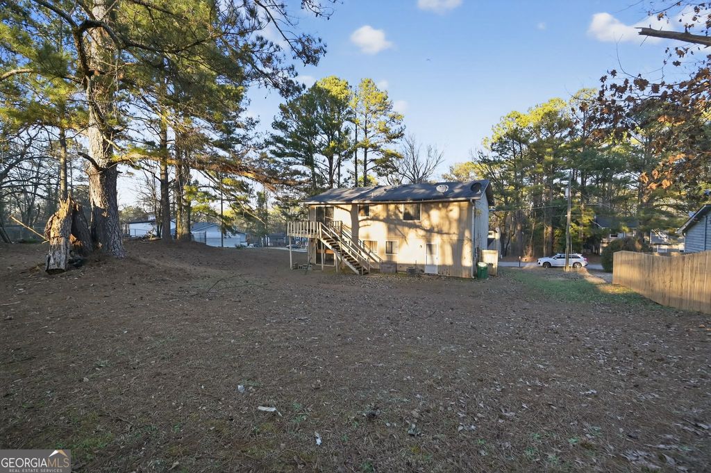 Photo of 4079 Day Trail S, Ellenwood, GA 30294 (MLS # 10678541)