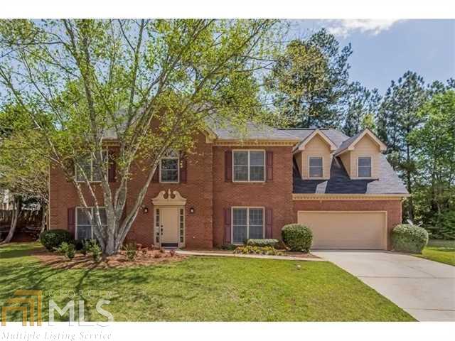 Move-in ready and so much house for the price! New kitchen appliances, new carpeting, new fixtures throughout and new tile and shower in master bath. Roof five years young. Too many other updates to mention. Large master suite with fireplace for cozy evenings. Lots of natural light throughout. Beautiful 2-story foyer. Professionally landscaped, private backyard with patio is ready for your summer entertaining with family and friends.Quiet, well-established subdivision on cul-de-sac. Tons of storage. Easy access to 20/285. Come experience this gem for yourself...