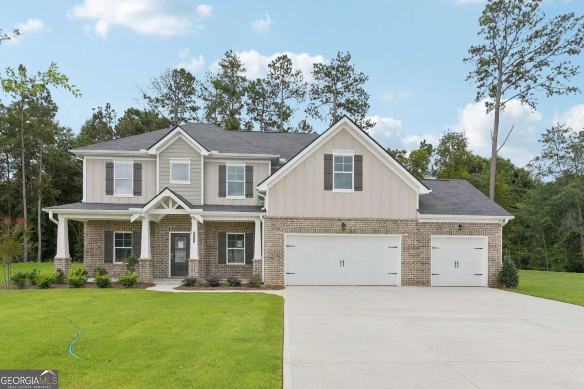 Earnest Money ONLY $3,000 and as low as $3300/monthly - Luxury Within Reach! Gorgeous 5-bedroom, 3-bathroom estate in a cul-de-sac and timeless design. From the grand two-story foyer to the sprawling open concept living spaces, every detail has been meticulously curated to enhance your lifestyle. Key Features: Designer Living Spaces - A stately family room with a gas fireplace, perfect for cozy gatherings. Gourmet Chef's Kitchen - Featuring high-end LG stainless steel appliances, gleaming granite countertops, and an oversized entertainment island. Luxurious Owner's Suite - Your private retreat with a spa-inspired ensuite, complete with premium finishes and a serene ambiance. Guest Suite on Main - With a private bath for ultimate convenience. 3-Car Side-Entry Garage - Offering both functionality and curb appeal. Energy-Efficient Living - LED lighting, gas & electric system installed. Prime Location - Nestled in Loganville, midway between Athens & Atlanta, just a short drive to renowned universities and colleges. Builder & Lender Incentives (with approved lenders): Up to $15,000 in incentives, Low fixed interest rates, 100% financing options, up to 5% down payment assistance, and more. The Richland plan at Stephen's Landing in Loganville.