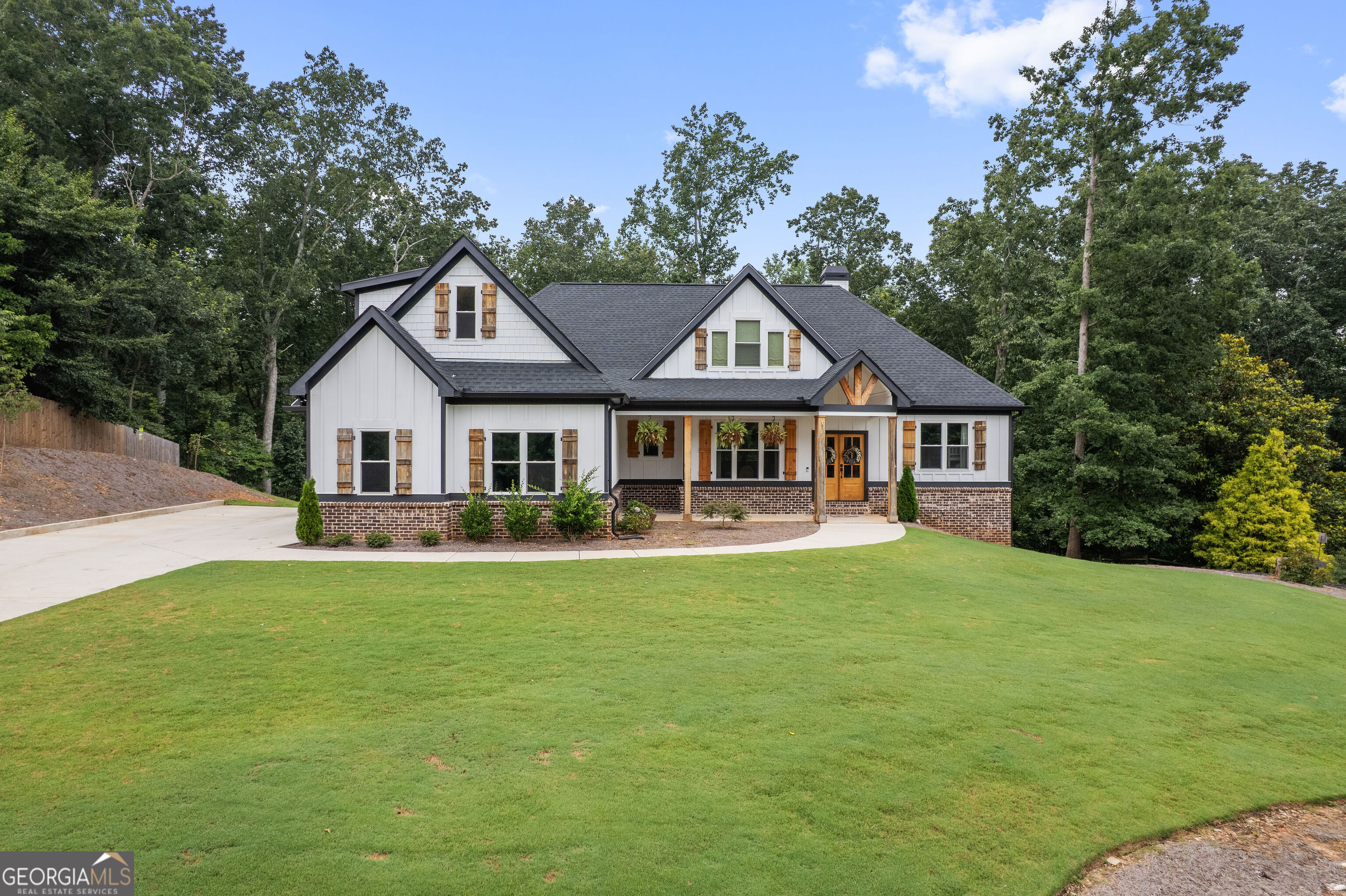 Better than New Construction - with a Basement! Why wait to build when you can move into this upgraded, better-than-new home featuring one of the most desirable floor plans in Autumn Brook? From the moment you step inside, you'll love the soaring vaulted ceilings in the family room, complete with a cozy fireplace-perfect for gatherings or quiet evenings in. The open-concept kitchen overlooks the family room and showcases a large island, ideal for entertaining or casual meals. A versatile flex room on the main floor offers the perfect space for a home office, library, or additional lounge area. The spacious owner's suite is privately tucked away on the main level and includes a spa-like bath with soaking tub, separate shower, and dual walk-in closets. Upstairs, you'll find an additional bedroom, full bath, and bonus room-perfect for teens, guests, or a home theater setup. Located in the sought-after Autumn Brook community, this home offers quick access to I-575, shopping, dining, and more. Don't miss your chance to own a move-in-ready home that truly stands out.
