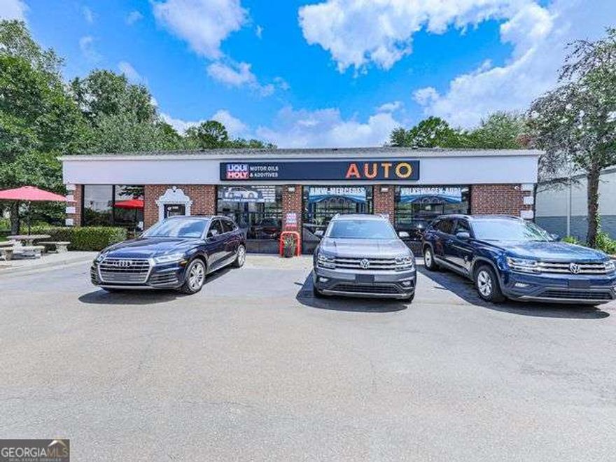 Amazing opportunity for a turn-key auto repair business! Start your new business or expand your current one. Well-established and successful automotive repair business specializing in European cars like BMW, Audi, Mercedes, Porsche, etc., with a deep client base of over 1800 past and current clients, excellent reviews, and reputation for white-glove service and quick turnaround.  Modern and up-to-date facility with high visibility at the intersection of Kimble Bridge Road and Old Milton Parkway with a traffic count of more than 50,000 vehicles-per-day and 2 monument signs.  4-sided brick building with 21 parking spaces features clean and bright reception and waiting area, management office, and customer restroom. 3 well-lit drive-through bays, each with lift and pit, including custom-made pit covers, make this ideal for a continued automotive repair business or adapt for an oil change business. Each pit has fluid drain trays that connect to two 500-gallon drain tanks. Full basement for parts storage and under-car maintenance. Small storage room and employee restroom too. One of only 4 Liqui-Moly Pro Line Center shops in Georgia! Excellent long-term potential for stability and growth with a median household income in 30005 of $171,000 and a population of over 218,000 within a 5-mile radius. You won't find another high-caliber turnkey operation like this anywhere. Call today for more details!