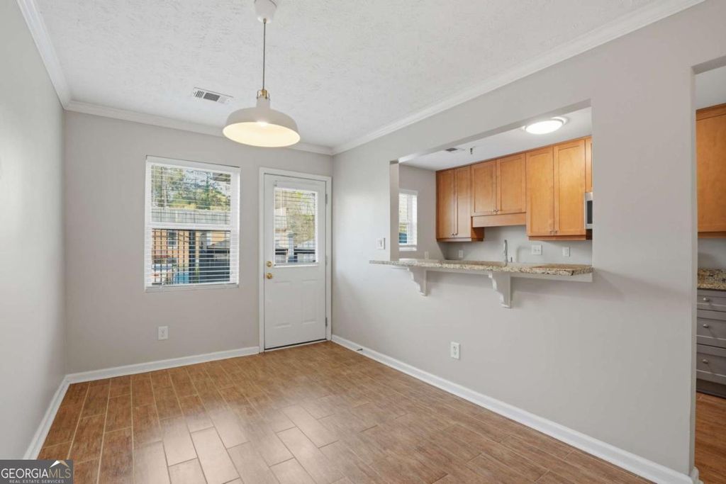 Photo of 215 Winding River Drive #F, Atlanta, GA 30350 (MLS # 10720054)