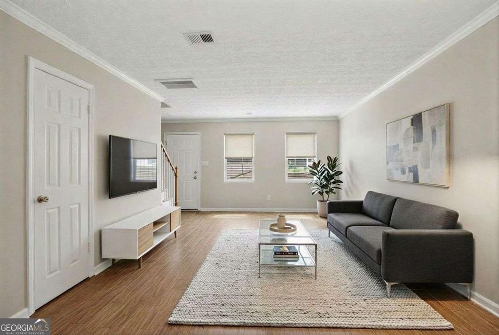 Photo of 215 Winding River Drive #F, Atlanta, GA 30350 (MLS # 10720054)