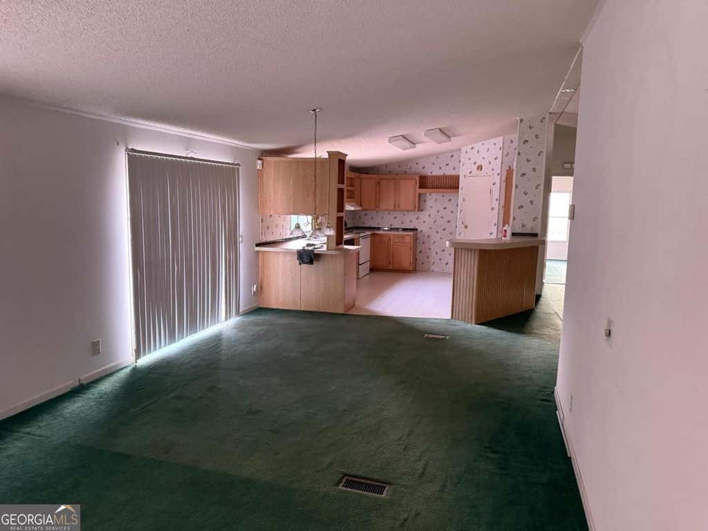 Photo of 415 McIntosh Trail, Senoia, GA 30276 (MLS # 10794601)