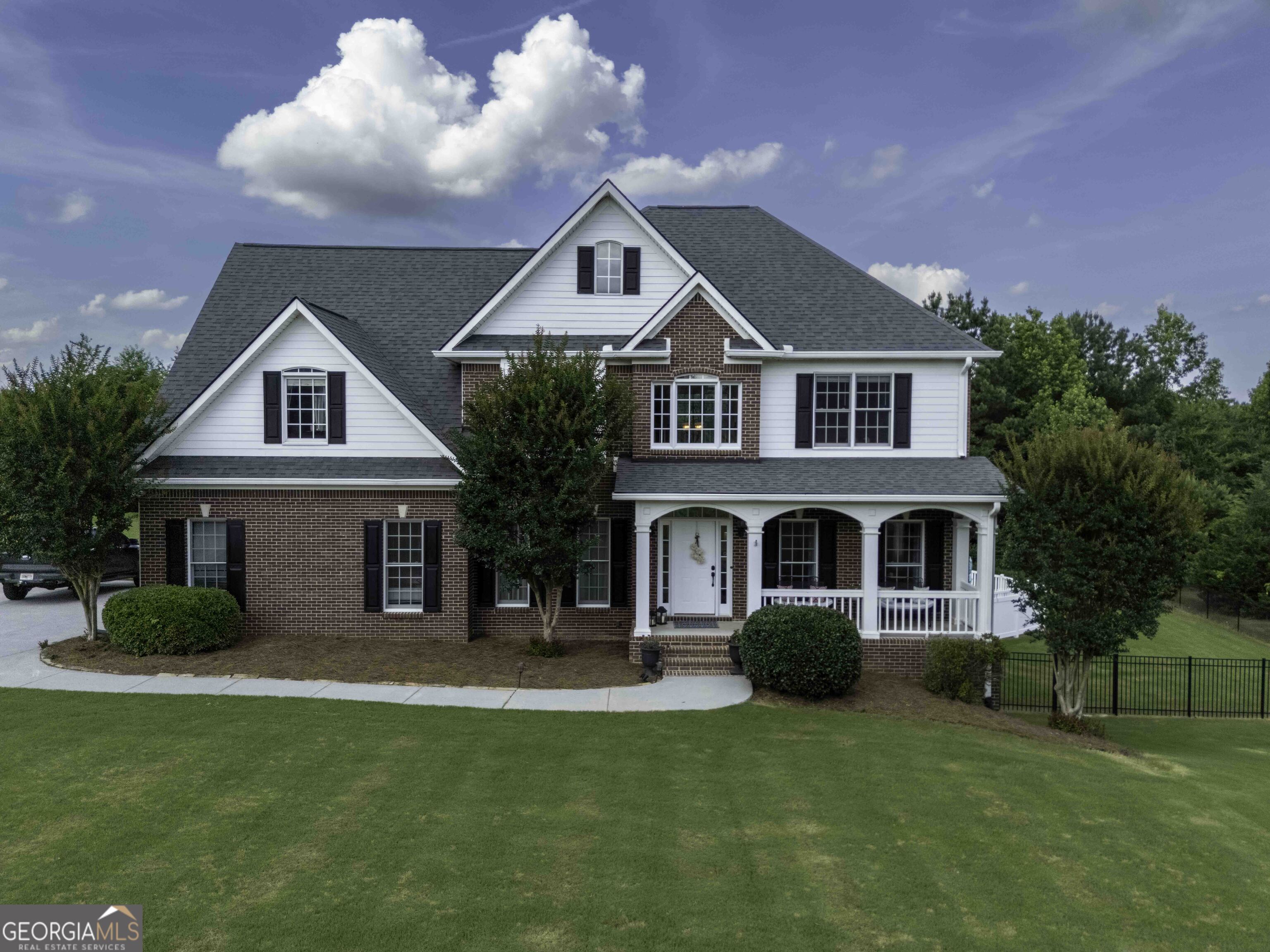 Step into your dream home in the sought-after Fields Ferry Golf Community! This stunning two-story, three-sided brick residence boasts five spacious bedrooms and two and a half bathrooms, perfectly designed for comfort and style with golf course views. Enjoy a bright, open floor plan ideal for entertaining, with a modern kitchen featuring solid surface countertops, a central island, and seamless flow into the living and dining areas. Step out onto the covered back porch and take in views of your private in-ground pool-a backyard oasis with ample space for relaxation or fun. The fenced backyard is perfect for letting pets run free or hosting family gatherings. Downstairs, the finished basement is an entertainer's paradise, complete with a home theater and pool table for the ultimate movie night or game day celebration.