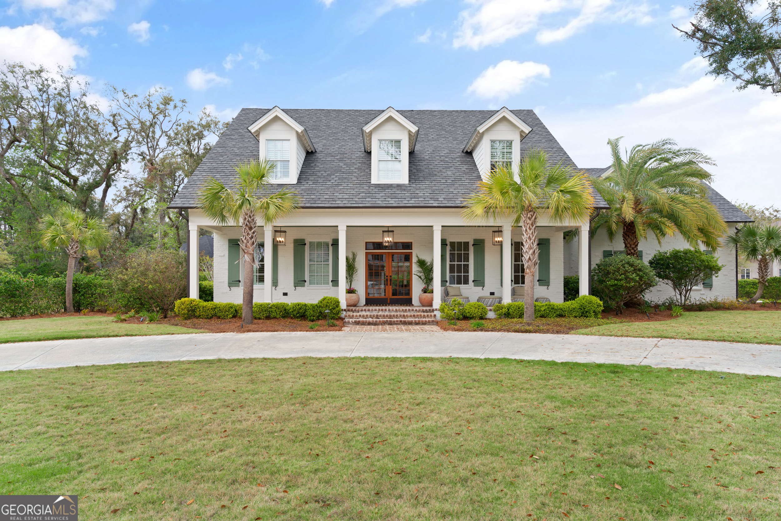 Built in 2021 and located on a desirable corner half-acre lot in the gated community of Hamilton Landing, this stunning 5-bedroom, 5.5-bath home offers the perfect blend of modern finishes, energy efficiency, and everyday comfort. The main-floor primary suite is a true retreat, featuring a spacious walk-in closet, a large shower, and a beautifully designed vanity. An additional above-garage apartment adds flexibility-ideal for guests, extended family, or a private office. The heart of the home is the open-concept kitchen, designed for both function and entertaining. Complete with a gas range, wine cooler, and ice maker, it's ready for gatherings of any size. Step outside to a covered porch equipped with a natural gas hookup-perfect for an outdoor kitchen setup. The deep well ensures water access for future landscaping or outdoor projects. With sidewalks winding through the neighborhood and a nearby park perfect for family outings, walks, and bike rides, the community encourages a vibrant and active lifestyle. The spacious lot offers endless possibilities: envision a pool, fire pit, garden, or your dream backyard retreat. This is more than just a home-it's a lifestyle.