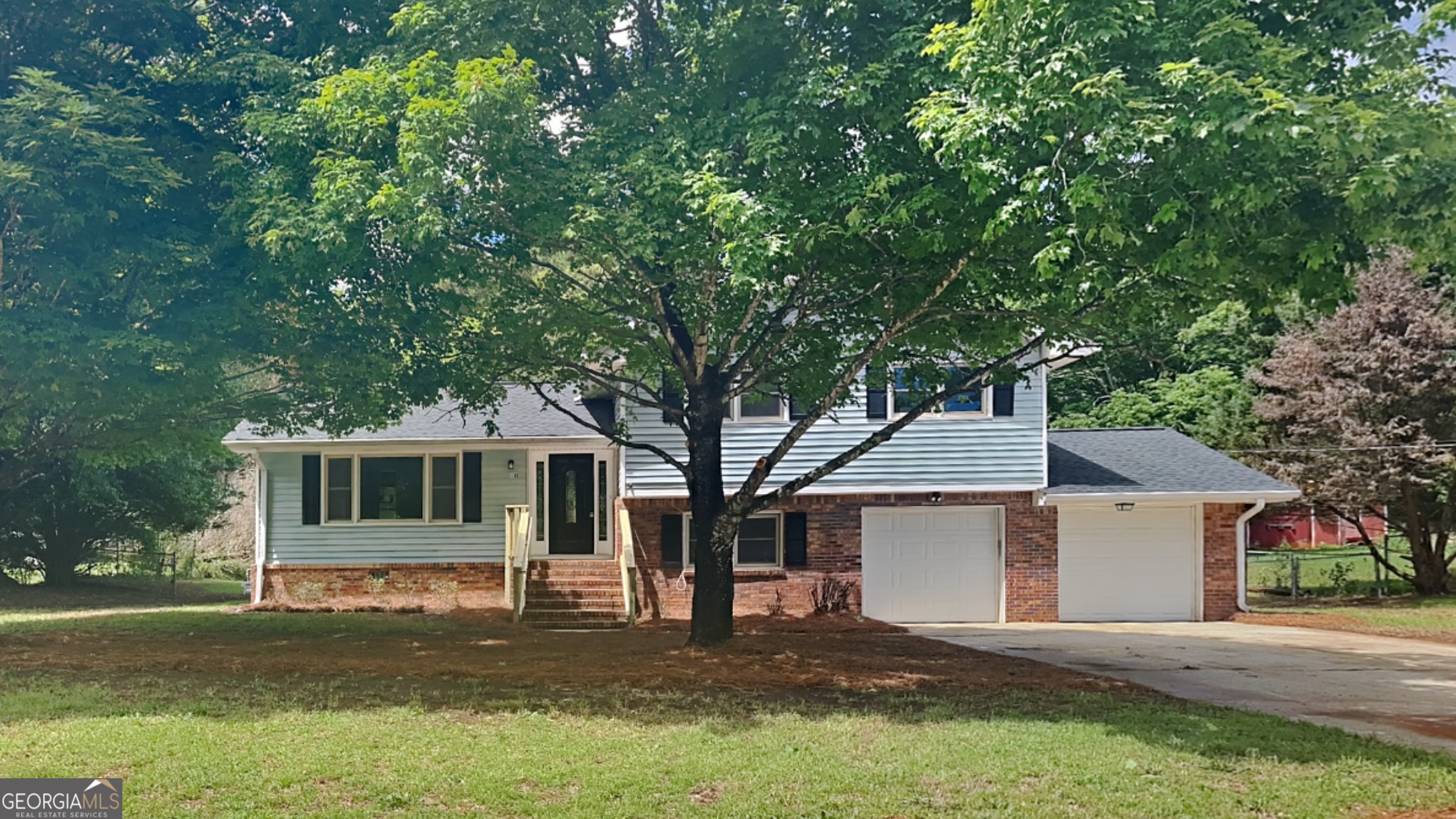 Beautifully Renovated 3BR/2BA Home in Prime Conyers Location - Move-In Ready! This 3-bedroom, 2-bath home has been thoughtfully updated from top to bottom and is ready for its next chapter. Located just minutes from local shopping, dining, and schools, you'll love the convenience of this quiet, established neighborhood. Step inside to find a freshly painted interior complemented by stylish new light fixtures, updated hardware and cabinet pulls, and refinished kitchen and bath cabinetry that give this home a modern yet cozy feel. The kitchen features brand new granite quartz countertops and new appliances. The family room is centered around a beautifully refinished fireplace surround, adding a warm focal point for relaxing evenings at home. The primary and guest bathrooms have been refreshed, including a refinished shower surround in the guest bath, and the home's HVAC system has been serviced for peace of mind. Outside, enjoy a freshly power-washed exterior and hardscapes, landscaped yard, and a fully fenced-in backyard-ideal for pets, kids, or outdoor gatherings. A detached storage building provides extra space for tools, hobbies, or seasonal items. And with a new roof, all the heavy lifting has been done for you! This home is a perfect blend of style, function, and location. Whether you're a first-time buyer, downsizing, or relocating, don't miss your chance to own a beautifully updated property in one of Conyers' most desirable areas.