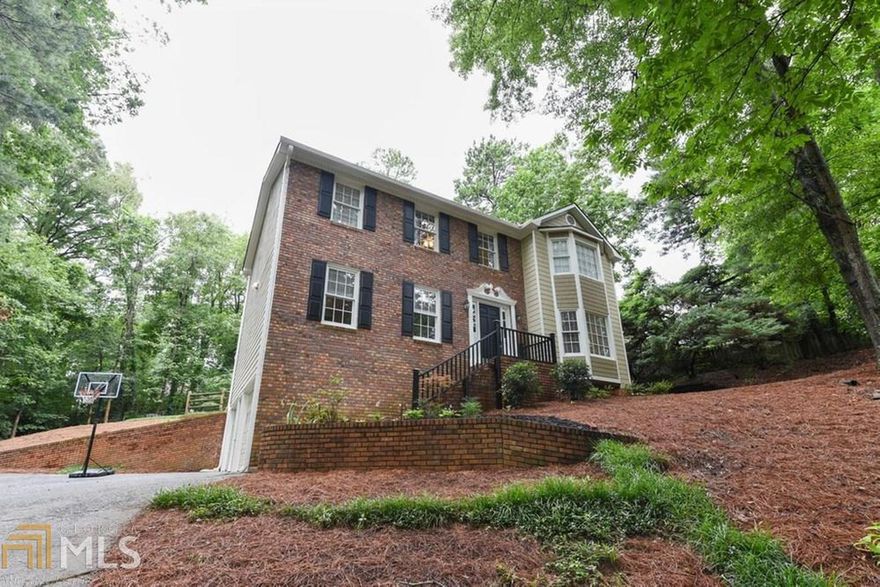 Beautifully maintained w/ numerous upgrades including a new & exquisite owner's bath renovation! The moment you open the door you'll be drawn to the gleaming hardwoods that grace most of the main level. Spacious LR & DR for entertaining. Large fireside den for casual enjoyment. Lots of cabinet and prep surface in the eat in kitchen which boasts an island; main level powder room nicely renovated! The upstairs holds all 4 bedrooms: 3 sizable guest rooms sharing a recently upgraded full bath; the substantial owner's retreat & luxurious bath which includes a free-standing soaking tub in a ship lap alcove, gorgeous tiled shower stall & glass enclosure, new dual sink vanity, lighting & faucets, walk-in closet. Finished flex space in the basement is ideal for rec room or office. Level back yard for play! Screened porch to keep the enjoy rain or shine! 2-car drive under garage w/ plenty of turn around space & room for additional cars in driveway.  "Must wear mask while inside propery"