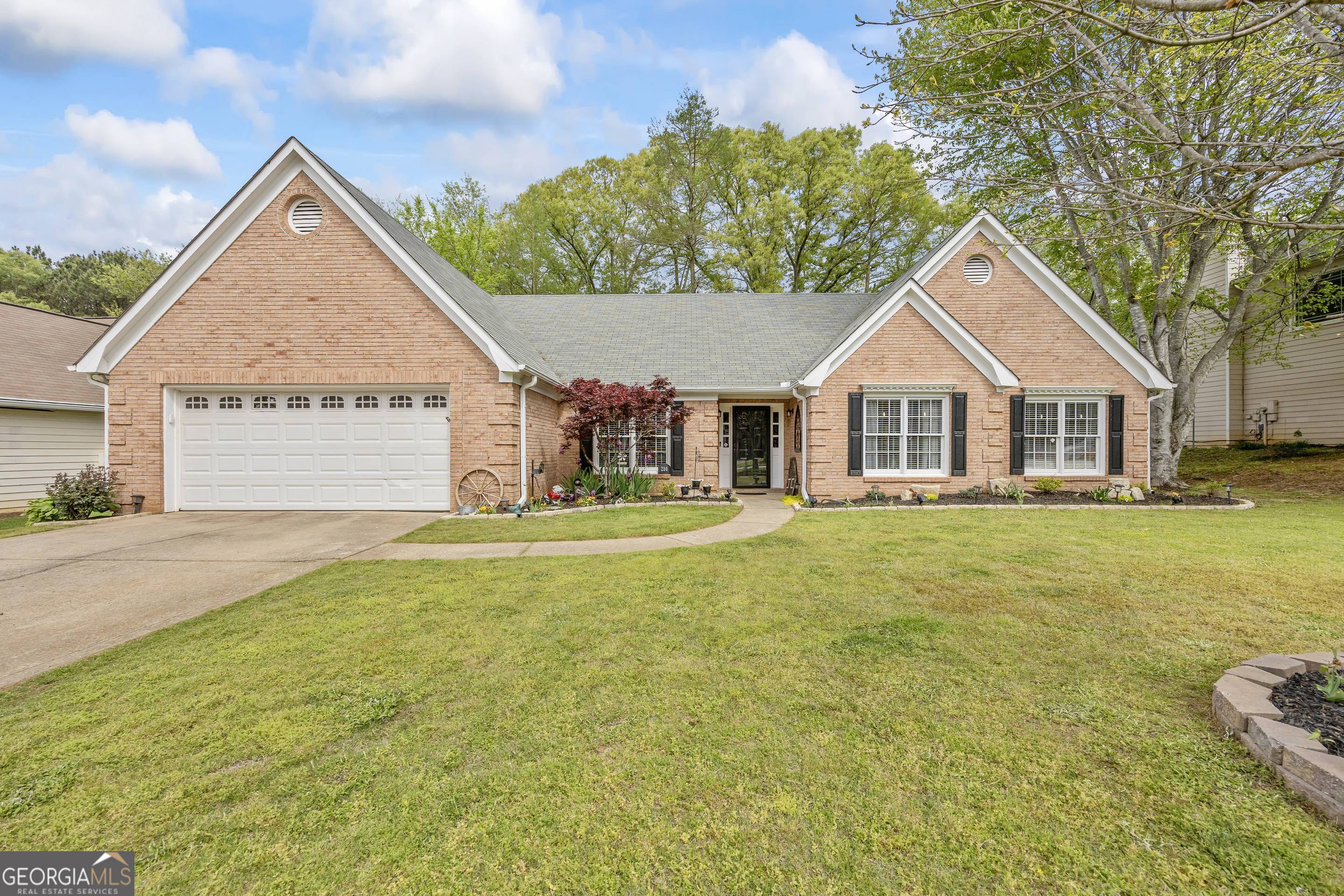 Enjoy the ease of a one level living in this lovely 3 bedroom, 2 bath ranch-style home. Step into the relaxing living room complete with a cozy fireplace. The warm inviting kitchen features white cabinets, stainless steel appliances and a convenient eat-in breakfast area. Easy access to the laundry room and spacious 2-car garage. Nestled in one of the area's most friendly neighborhoods, just steps away from top-rated schools, shopping, parks, and community playgrounds. The back yard provides the perfect setting for weekend barbecues and playtime. With quiet, tree-lined streets, community swimming pool, tennis & basketball courts and a community lake. Everyone will enjoy this outdoor living.