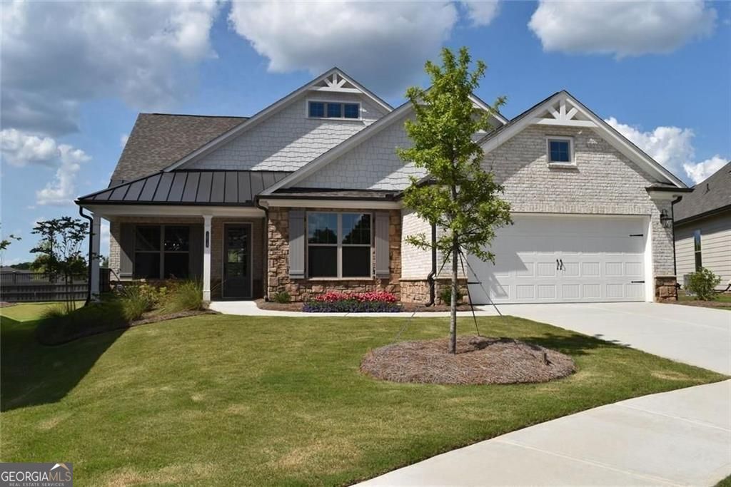 Welcome to Soleil Summit Chase! A Gated Luxury Resort Style 55 and Better Active Adult community by award Winning Builder Patrick Malloy Communities. Nestled in a quiet setting of established communities and pastoral estates, Soleil Summit Chase will offer the resort style of living unlike anything in the Gwinnett area! The community offers an approximate 5,000 sq ft Clubhouse with a Great Room and Bar for relaxation and socializing, a Catering Kitchen for events or even start your very own Cooking Class! There is a Fitness Room and a Yoga Patio as well as two Flex Room for a fun game night, book club or other activities. In addition to fitness and yoga patio, you could always enjoy the swimming pool with sun shelf! For those who love the outdoors, a Grilling and Fire Pit area, a community Garden, Event Lawn, a Dog Park, and Pickleball Courts. And enjoy the many future events planned by the community's very own Resort Director! Our Montrose plan is another favorite for Soleil homeowners, at 2264 open concept living space with soaring 11-foot ceilings! A covered front porch greets you at foyer entry an adjacent formal dining room. Moving into your open concept living area is your Family room, Kitchen with huge island with breakfast bar, walk-in pantry, stainless appliances and a separate eating area with access to huge covered rear patio! The primary bedroom with spa-like ensuite with zero entry shower with bench and his/hers closets! In true split bedroom style, a secondary bedroom and bonus room are off of hallway, the bonus room may easily be converted into a 3rd bedroom. A full bath for guest and linen closet storage, laundry room with upgraded sink with cabinetry. HOA includes yard maintenance, Internet, and securing monitoring system. Don't miss out on the savings offered now on Quick Move-In homes!! Soleil Summit Chase isn't just a community of Ranch style homes; it is truly a New Lifestyle where it's all about You!!