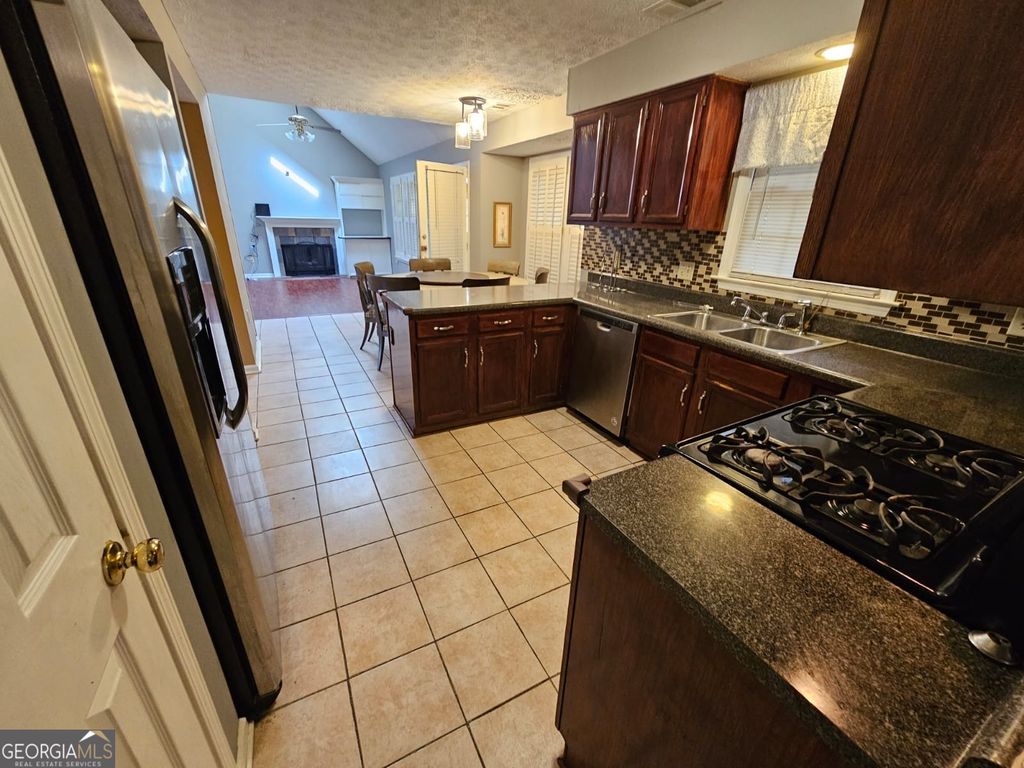 Photo of 4933 Clubgreen Summit, Stone Mountain, GA 30088 (MLS # 10625228)