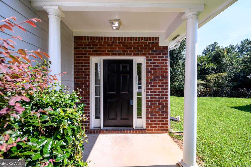 Photo of 6550 Browns Mill Ferry Drive, Lithonia, GA 30038 (MLS # 10822239)
