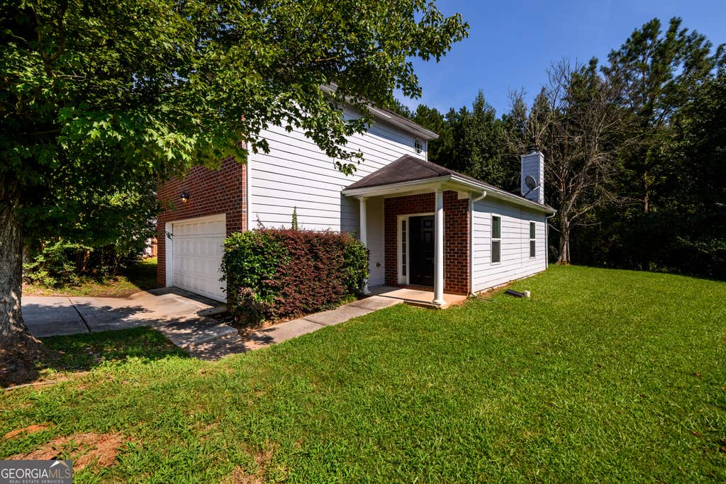 Photo of 6550 Browns Mill Ferry Drive, Lithonia, GA 30038 (MLS # 10822239)