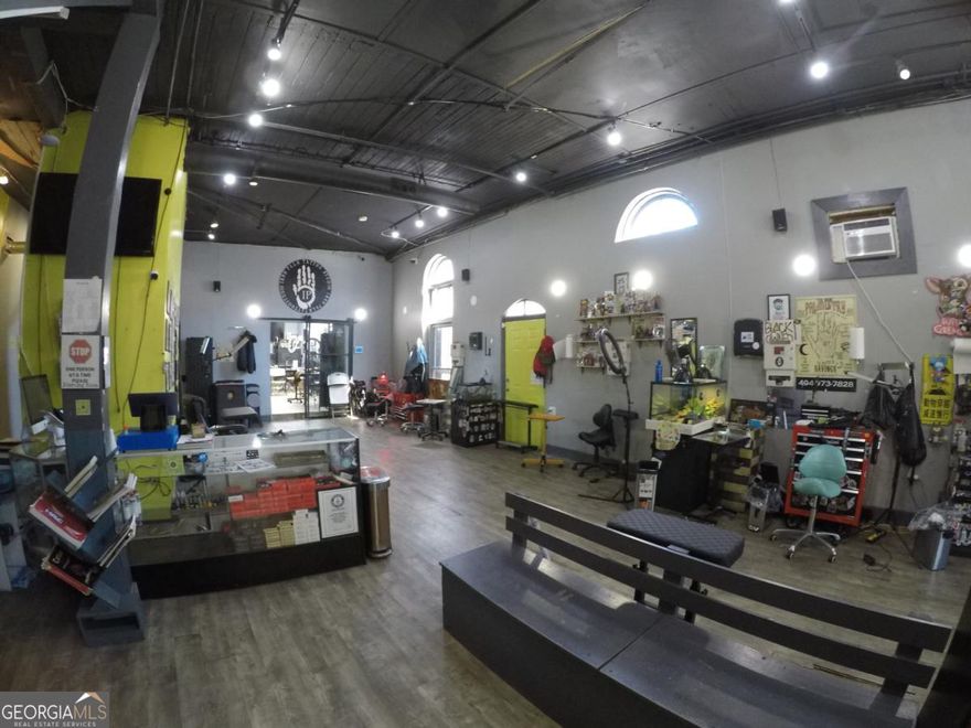 Nestled in the heart of Downtown Atlanta, this 35,000 SF mixed-use property spans three contiguous parcels (approximately 0.30 acres) and represents a truly unique investment opportunity. Offered at $8,000,000 with a projected Net Operating Income of $430,000, the asset provides strong in-place cash flow from a diversified rent roll, alongside significant long-term upside. The current tenant mix includes recently renovated apartments and street-level retail (a tattoo shop and salon), plus several restaurant/lounge/nightclubs with new tenant buildouts underway - creating multiple income streams under one roof. Extensive renovations (including a brand-new roof and modernized apartments) have already been completed, enhancing the property's appeal and minimizing future capital expenditures for a new owner. trategically positioned amid Downtown's ongoing resurgence, 251 Trinity Ave SW offers unparalleled redevelopment flexibility thanks to its SPI-1 zoning. The site is surrounded by transformative development activity - just steps from Atlanta Tech Village's new downtown campus and Wild Leap Brewery - and benefits from proximity to major projects fueling growth in the area. This mixed-use asset perfectly balances immediate income production with future redevelopment potential, making it an ideal acquisition for investors and developers seeking both stable cash flow and long-term value appreciation in a prime urban location.