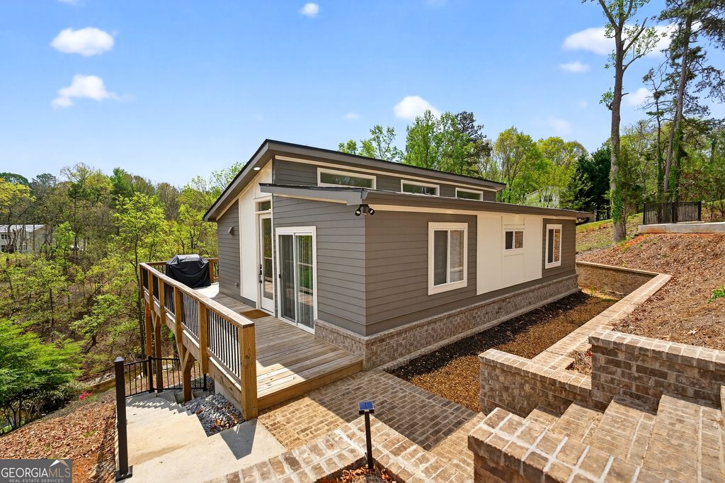 Photo of 6564 Bermuda Lane, Flowery Branch, GA 30542 (MLS # 10724870)