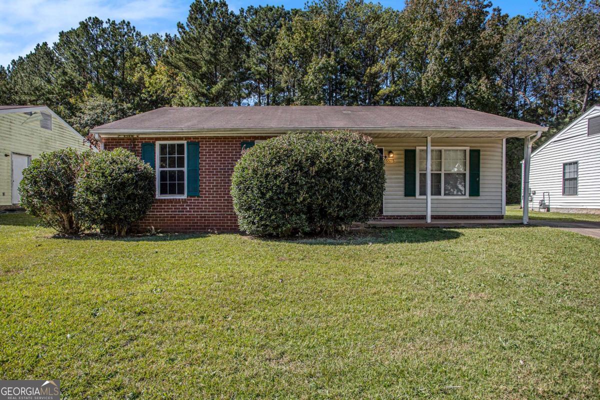 Welcome to this three bedroom ranch located in an established neighborhood with a lovely covered front porch great for relaxing and entertaining guests. The kitchen is equipped with modern appliances and ample cabinetry & countertops for space and food prep. The sunny dining area is right outside the kitchen with sliding glass doors that open up into the backyard. It features a spacious family room, large bedrooms, and 1 full & half baths. Nestled in a sought after community in close proximity to convenient shopping, dining options and Hartsfield-Jackson Airport. Perfect for first time buyers and investors. Don't miss this opportunity to turn this property into your dream home.