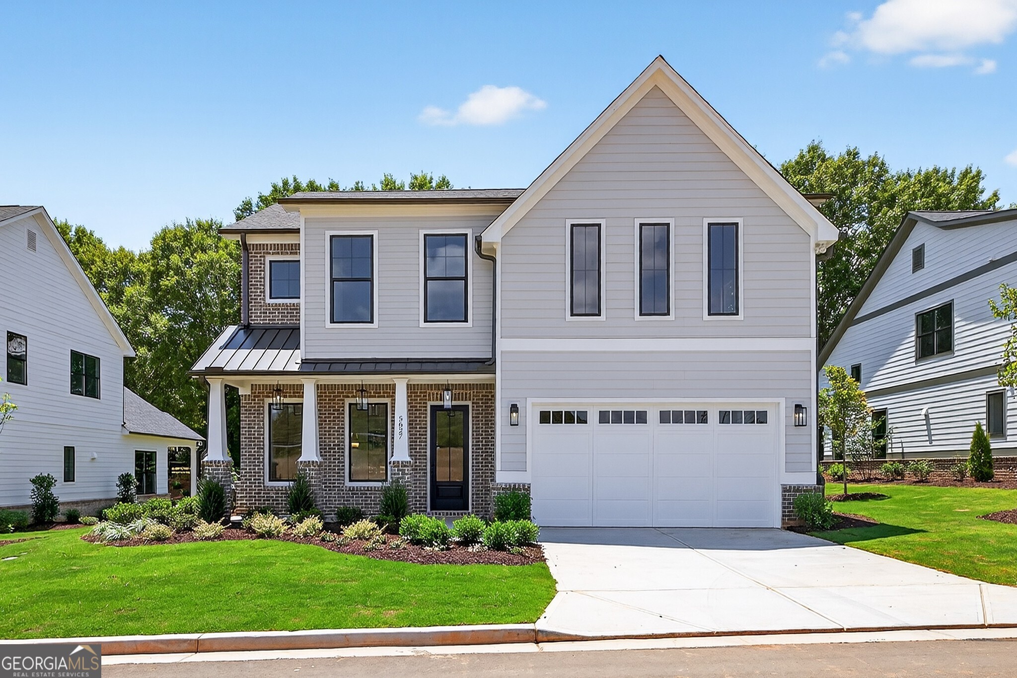 The Carie Plan built by Heatherland Homes. Quick Move-In! From the moment you step inside this amazing home, you'll be surrounded by thoughtfully selected finishes and timeless architectural details that exude sophistication. Coffered ceiling accents in the dining room, and hardwood flooring throughout the main floor living areas create a sense of elegance and comfort. Throughout the home, quartz countertops provide a seamless blend of beauty and durability.The heart of the home is a chef-inspired kitchen, featuring sleek double ovens, premium appliances, kitchen cabinets to the ceiling and a dramatic oversized island designed for both casual meals and entertaining in style.The primary suite offers a peaceful sanctuary, complete with an oversized walk-in closet, a spa style luxurious bathroom complete with large shower and soaking tub.it's the perfect escape after a long day. Community amenities include a dedicated dog park, offering a welcoming space for pets and neighbors alike. Don't miss the chance to own this exceptional home where refined design and everyday functionality come together in one of Northwest Cobb's most desirable new communities. Limited time offer with Special inventory pricing! Ask about our $20,000 Any Way You Want it Incentive with use of sellers preferred lender and binding contract by 9/30/2025! **All photos are stock photos from builder**