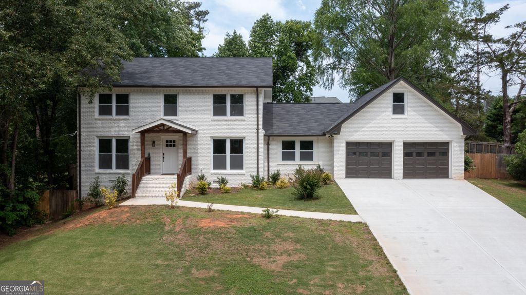 Photo of 4307 Cedar Wood Drive SW, Lilburn, GA 30047 (MLS # 10764932)