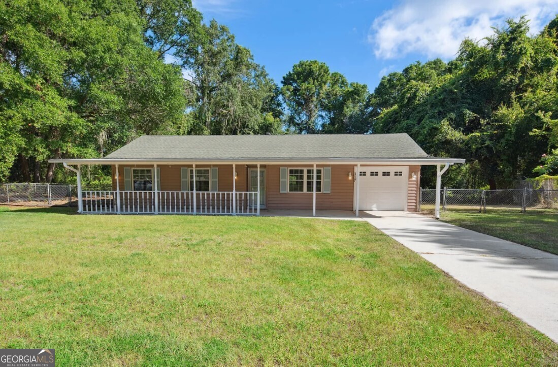 Charming Updated Ranch-Style Home! This nicely refreshed 3-bedroom, 2-bath home offers 1,236 sq. ft. of comfortable living space with stylish updates throughout. Enjoy low-maintenance porcelain tile flooring in every room-no carpet! Fresh interior paint, including newly painted ceilings, kitchen, and vanity cabinets. The kitchen features new marble-look Formica countertops, SS appliances and a recently added indoor laundry/pantry area for added convenience. Step outside to a charming front porch, and a large fully covered and screened-in porch on the back, which is perfect for entertaining . There is a fully fenced backyard. New roof. Close to base, schools and shopping. OWNER OFFERING 18 MONTH LEASE ONLY........ MONTHLY RENT: $1600.00.... RESIDENT BENEFITS PACKAGE: $39.95.... TOTAL MONTHLY DUE: $1639.95.... PETS: Pet Fees Apply, Where Applicable: $300 per pet/year or $25 per pet/month. Some Breed Restrictions Apply. See application for details. All residents automatically enrolled in Resident Benefits Package (RBP) for $39.95 per month. This package includes several benefits including, Renter's Insurance, HVAC Air Filter delivery , AURA $1M Identity Protection Plan, Top-notch resident rewards program including , Credit Building Pinata membership, improving your credit score by simply paying rent on time . 24/7 access via Resident Portal for payments, service requests, e-signatures, and more. Additional information is available during the application process.