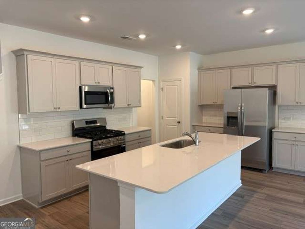 Photo of 3007 Humdala Place #128, Buford, GA 30519 (MLS # 10784122)