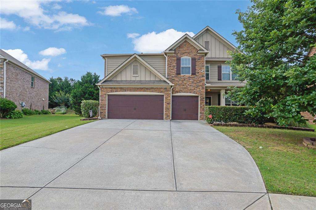 Welcome to 425 Eldridge Dr, a beautifully maintained, move-in ready 3-sided brick home nestled in the highly sought-after Nichols View subdivision of Suwanee! This spacious 5-bedroom, 4 full bathroom residence with a 3-car garage blends timeless curb appeal with modern comfort, all within one of Forsyth County's top-rated communities, and it's priced to sell! Step inside to an inviting open-concept layout featuring LVP flooring throughout the main level. The gourmet kitchen is the heart of the home, offering clear sight lines into the family room, living room, and elegant dining area with coffered ceilings. A center island, gas range, and stylish tile backsplash make this kitchen ideal for cooking, entertaining, and everyday living. A guest bedroom and full bath on the main floor offer flexibility for visitors or multi-generational families. Upstairs offers four generously sized bedrooms, two versatile lofts: ideal for a media room, office, or playroom, with brand new carpet on the stairs and common areas. The oversized primary suite features a tray ceiling, private sitting room or nursery, and his-and-her walk-in closets. The spa-inspired primary bathroom includes a dual vanity, soaking tub, and separate walk-in shower. Step outside to a backyard built for relaxation and fun. Enjoy evenings on the extended patio next to the outdoor brick fireplace, while children or pets play safely in the private one-third-acre fenced yard. This house also offers a 3-car garage with EV charger for your convenience. Best of all, this home is within walking distance to the community pool and playground, offering an active lifestyle just steps from your door. Located near top-rated schools, including Lambert High, Riverwatch Middle, and Settles Bridge Elementary, plus easy access to parks, shopping, and dining, this home truly has it all. Don't miss your chance to own this rare gem in one of Suwanee's premier communities. Schedule your showing today! Discounted rate options and no lender fee future refinancing may be available for qualified buyers of this home.