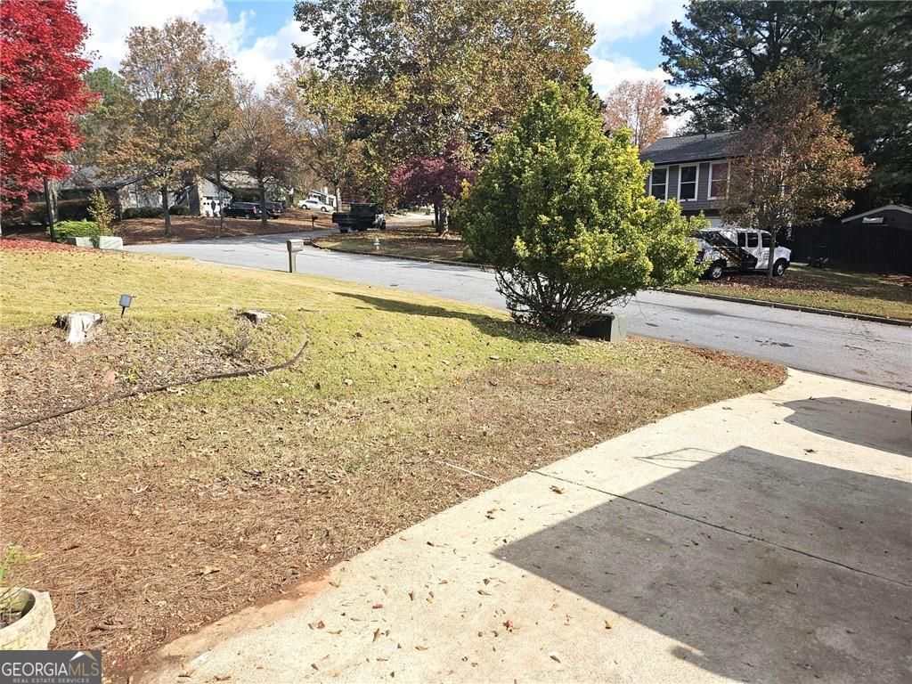 Photo of 10085 Old Woodland Entry, Johns Creek, GA 30022 (MLS # 10776131)