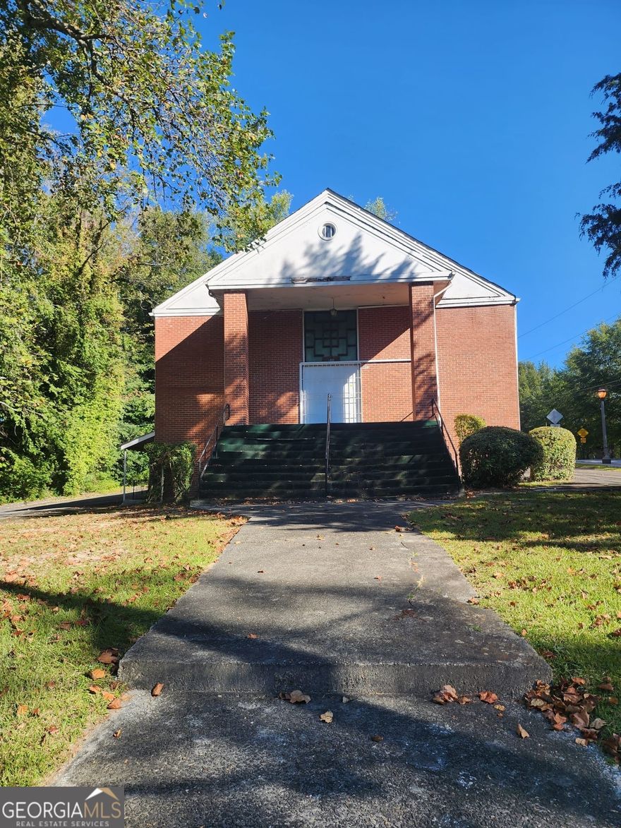 This beautiful historic church, located in the vibrant Joseph E. Boone/Woodward area, offers a world of possibilities. With a sanctuary that seats up to 200, a fellowship hall, a clergy office, and restrooms all on the main floor, it's ready to continue serving as a place of worship or be transformed for other creative uses. The lower level includes a multipurpose hall, a space for baptisms, a kitchen, and ample storage, offering flexibility for community events, meetings, or other functions. The property also includes parking for 20+ vehicles, with additional street parking available. Musical instruments are on-site and can be sold with the property if desired. Whether you envision keeping it as a church or reconfiguring it for a new purpose, this versatile space offers endless opportunities.