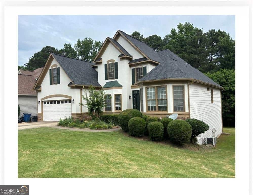 Photo of 87 Towne Park Drive, Lawrenceville, GA 30044 (MLS # 10800315)