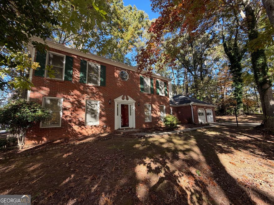 Wonderful area and location in Peachtree City's Crescent Oak Subdivision on the Braelinn golf course with homes selling in the 660K range, zoned for Starrs Mill High School. This home needs a little TLC and is priced accordingly and priced to move with a cash sale. This two story traditional home  has 4 bedrooms and 3 full baths. The layout has the primary owners suite bedroom and two additional bedrooms and 2 full baths upstairs.  Owners Bath has a good sized separate shower and separate Jacuzzi tub, two sinks and large vanity top in the owner's bath. All bathrooms have tiled floors.  The main floor entry has a formal living room and formal dining room up front, a bedroom and full bath on the main floor, a good size Kitchen and eat in area, a separate family room with a fireplace. The large sunroom on the back of the home is connected to the central heat and air and was added shortly after original construction so may not be counted in the 2322 sf County tax square feet number, so the home may be larger than stated in the tax records, but buyers to verify the sf. Also there is a mudroom/ laundry room with a window, a 2 car attached garage with two garage door openers. No steps, level entry from the garage to the mudroom. The home is livable but needs TLC and updates inside and out, while  mostly in the original 1987 condition. This is a one owner, Estate sale, Sold as-is. Use showingtime for Appts. Supra Lockbox