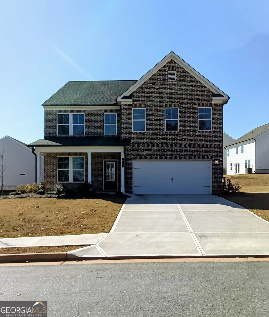 Welcome to Stanley Martin Homes,  you are greeted with the Hollins plan, you can mix and mingle with friends and family in your open-concept first floor, which includes a kitchen overlooking the family room and dining area. A bedroom at the front of the home can be used for guests to have their own private space. The covered front porch or rear patio provide the perfect spot to relax and enjoy your new home. Upstairs, the Primary suite boasts ample space, including a large walk-in closet off the on-suite bathroom with double vanities, walk-in shower and separate soaking tub. Additional bedrooms provide the perfect place for family or friends to rest their heads at night. Plus, take the chore out of doing the laundry with a conveniently located laundry room on the upper level! Some of the SMart Selected design options in this home include a gourmet kitchen & center island, large owner's suite with walk-in closet and on-suite bath, patio, main level bedroom and full bath. Lot 79.River Oaks is perfectly positioned to offer the best of Locust Grove living. With easy access to I-75, you will be minutes from: Tanger Outlets, Historic Downtown Locust Grove, Shopping and dining destinations. The area is also surrounded by popular attractions, including Noah's Ark Animal Sanctuary, High Falls State Park, and the Atlanta Motor Speedway. Photos shown are of a similar home.