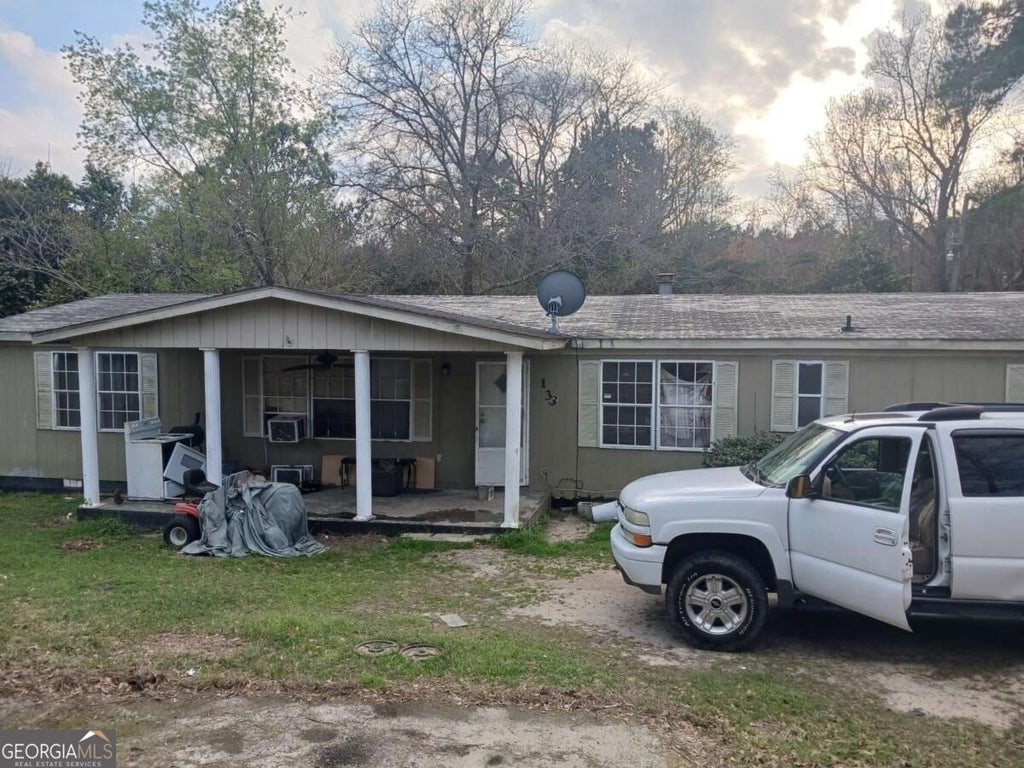 Photo of 133 Mckinnon Street, Claxton, GA 30417 (MLS # 10876124)