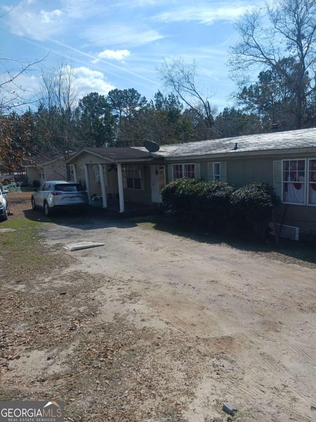 Photo of 133 Mckinnon Street, Claxton, GA 30417 (MLS # 10876124)