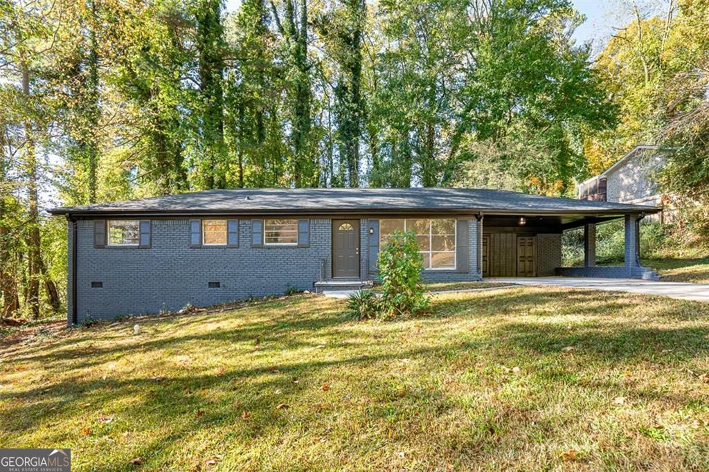 Welcome home to this beautifully renovated 3 bedroom brick ranch home on a quiet cul-de-sac ideally located just minutes from downtown Atlanta, major highways, and Hartsfield-Jackson International Airport. This home features a brand new roof, brand new HVAC system, and brand new stainless steel appliances, along with new paint throughout, renovated bathrooms, and beautiful hardwood floors. Complete with a carport and backyard accessible off of the kitchen, you'll love the open living spaces and brightness throughout. These thoughtful updates throughout mean minimal maintenance for years to come, making it an ideal investment. Whether you're a first-time homebuyer or an investor seeking a prime opportunity, this home offers the best for both worlds. Look no further for the perfect ATL opportunity!
