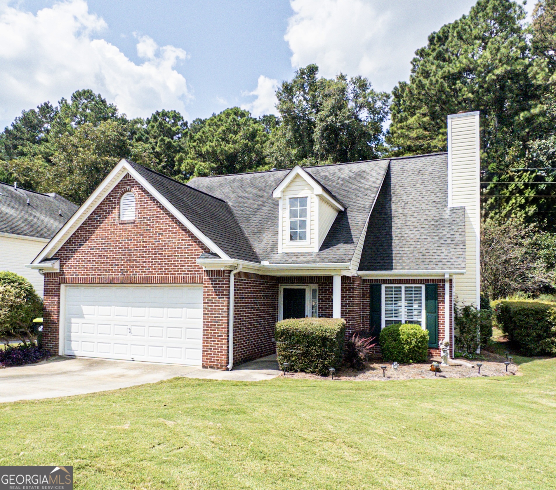 Lovely Fayette County Home on Greenbelt Lot Welcome home to this charming 4-bedroom, 2.5-bath beauty perfectly situated on a private greenbelt lot in one of Fayette County's most desirable school districts. Step inside to a spacious main-level master suite for convenient living, and enjoy a huge vaulted family room with a cozy fireplace-perfect for gatherings. The bright sunroom brings the outdoors in, while the dining room is ideal for entertaining. A large kitchen with plenty of counter space makes meal prep a breeze. Upstairs, you'll find three additional bedrooms for family, guests, or office space. New carpet! Outside, the fenced yard and deck provide the perfect retreat for relaxing evenings or weekend BBQs. The two-car garage offers ample storage, and yard maintenance is included, so you can spend more time enjoying your home and less time worrying about upkeep. Conveniently located near top-rated Fayette County schools, shopping, and parks - this home offers comfort, space, and peace of mind in a truly special setting. Don't miss your chance to make this rare opportunity yours - schedule a showing today!