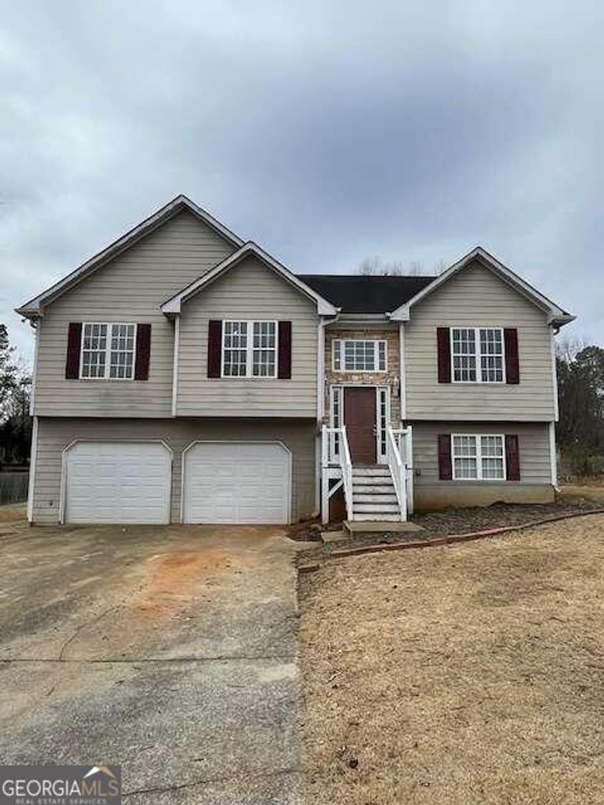 This split-level home with 4 bedrooms and 3 bathrooms has a promising layout and ample potential for improvement. The structure is divided into multiple levels, creating distinct living spaces that can be creatively utilized. The 4 bedrooms provide ample space for a family or individuals seeking room for various purposes like bedrooms, home offices, or guest rooms. While the home requires a significant amount of work, the potential lies in the opportunity to personalize and enhance the living spaces.