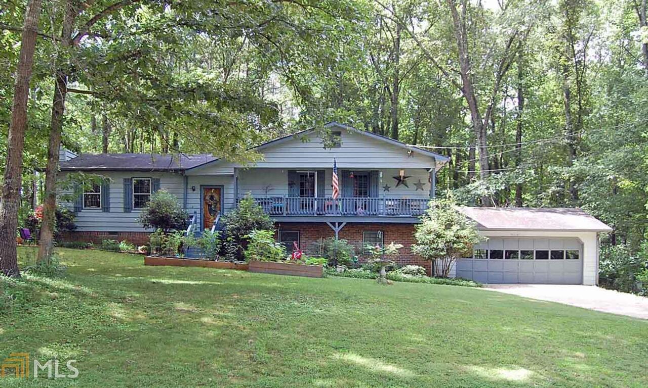 Canton- Traditional split level with covered balcony is priced to sell. Features three bedrooms, two baths, formal dining room, eat-in kitchen with pantry. Great room with bookcases and fireplace. Master suite with walk-in closet. Vaulted sunroom and private backyard with fenced area. Unfinished basement. New roof.