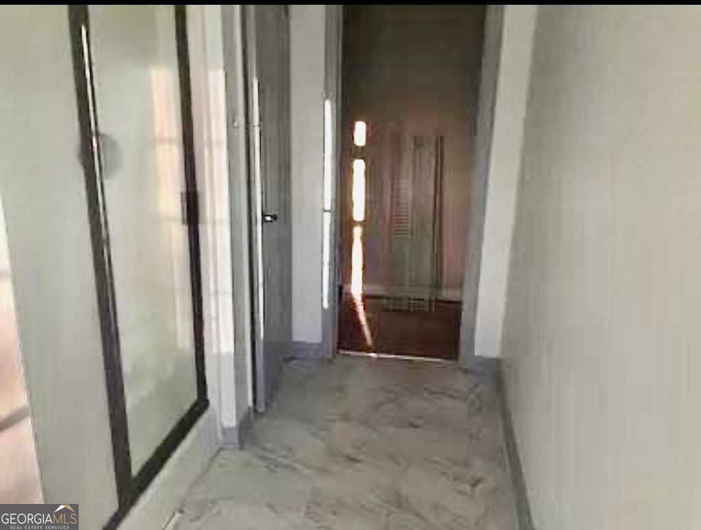 Photo of 1870 Garbrooke Cove, Lawrenceville, GA 30046 (MLS # 10688084)