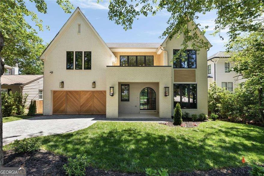 Located on one of the most desired streets in Brookhaven this brand-new custom home checks all the boxes! Tucked away in sought-after Ashford Park this gem is walking distance to all the incredible restaurants and shops Dresden has to offer including the new development which just opened. With 5 bedrooms, 5.5 bathrooms, a 2-car garage, and an unfinished basement, this new construction offers fresh, modern living in an unbeatable location. Step into a light-filled two story foyer that opens to a thoughtfully designed main level featuring a guest suite with a private bath and walk-in closet. The open-concept kitchen boasts a large island, top-of-the-line appliances, walk-in scullery, and clear views into the fireside family room. A separate dining room includes a built-in beverage centerCoperfect for entertaining. The main floor also includes a powder room and a mudroom for added functionality. Upstairs, the spacious ownerCOs suite impresses with vaulted ceilings and a luxurious bath offering double vanities, a soaking tub, and a separate shower. Three additional bedrooms each have en-suite baths and walk-in closets, and the laundry room is conveniently located on the second floor. Enjoy outdoor living year-round on the covered back porch with a fireplace and this lot is perfect for a FUTURE POOL. All just a short stroll to the shops, restaurants, and energy of Brookhaven VillageCoyour own social and dining oasis.
